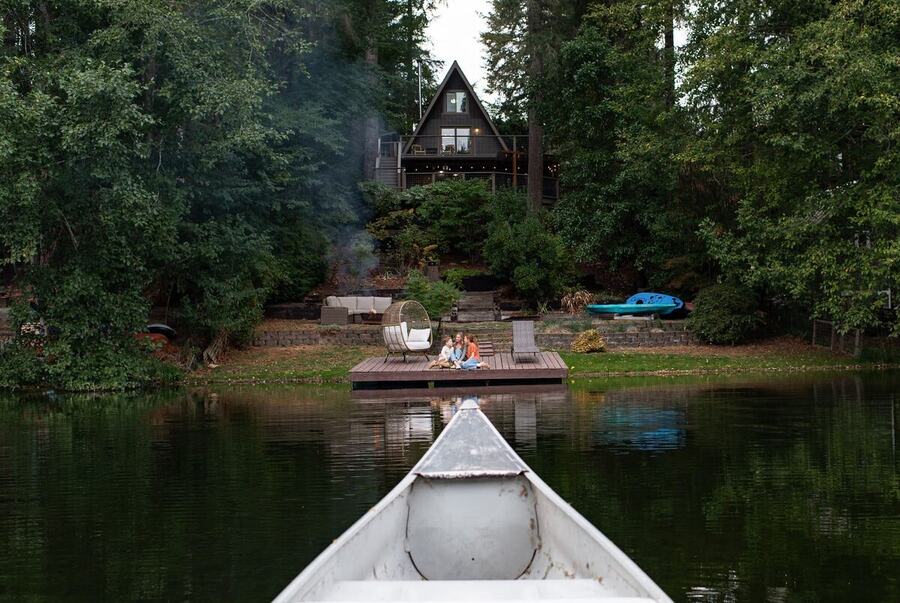 Paddling the canoe back across Lake Minterwood toward the cabin and dock