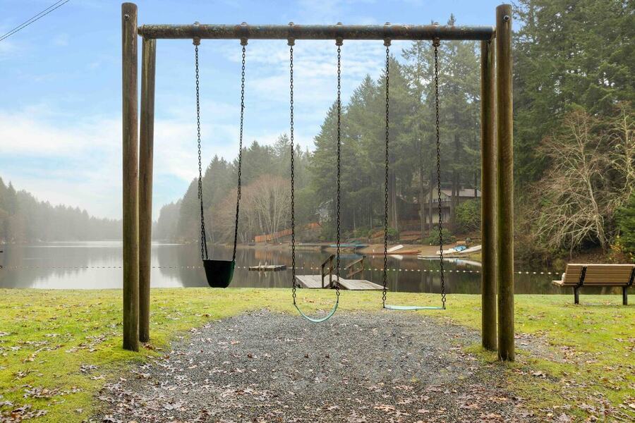 The swing set at the lakeside community park a short walk from the cabin
